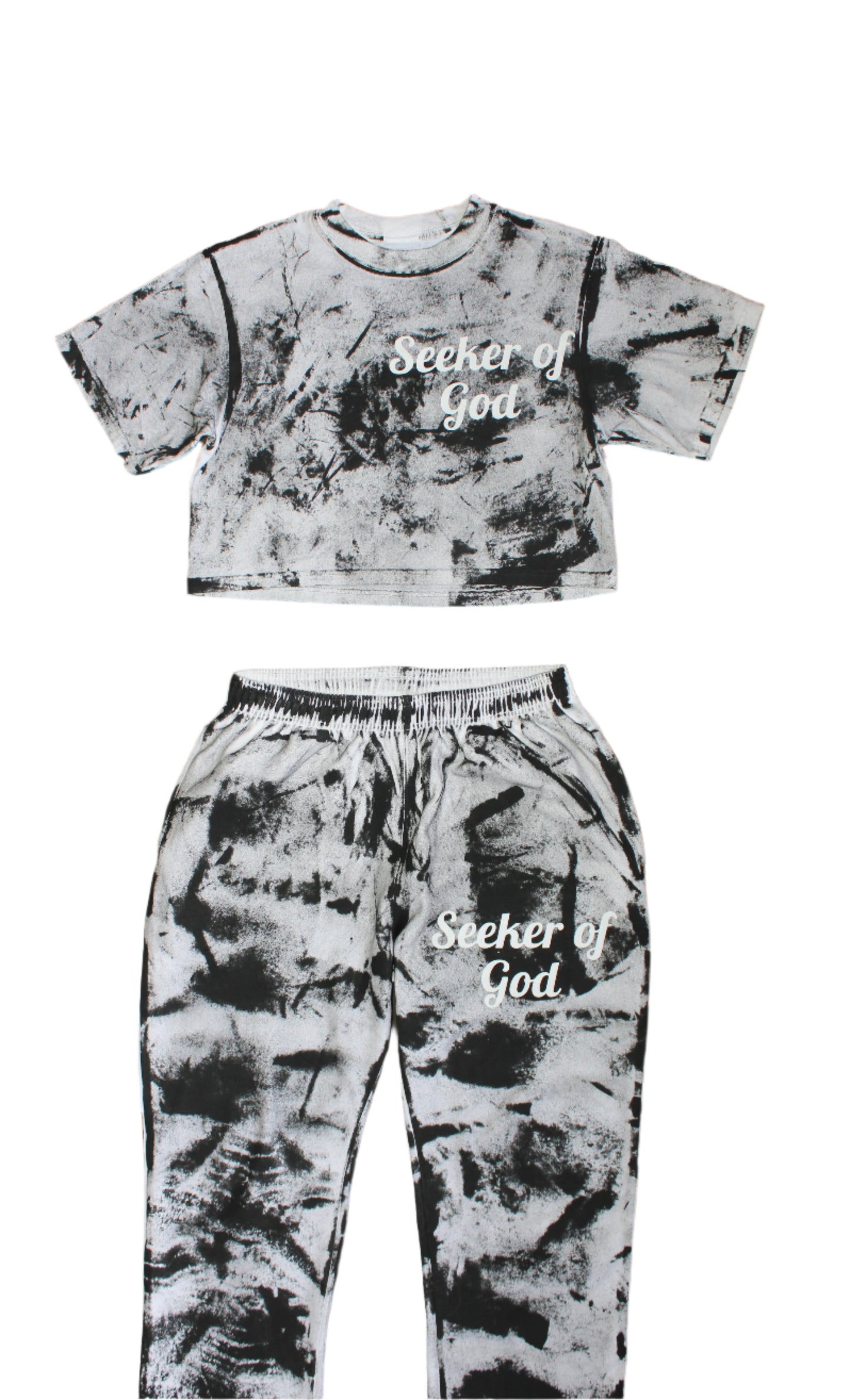 Tie-dye outfit with 'Seeker of God' text on a tiled floor