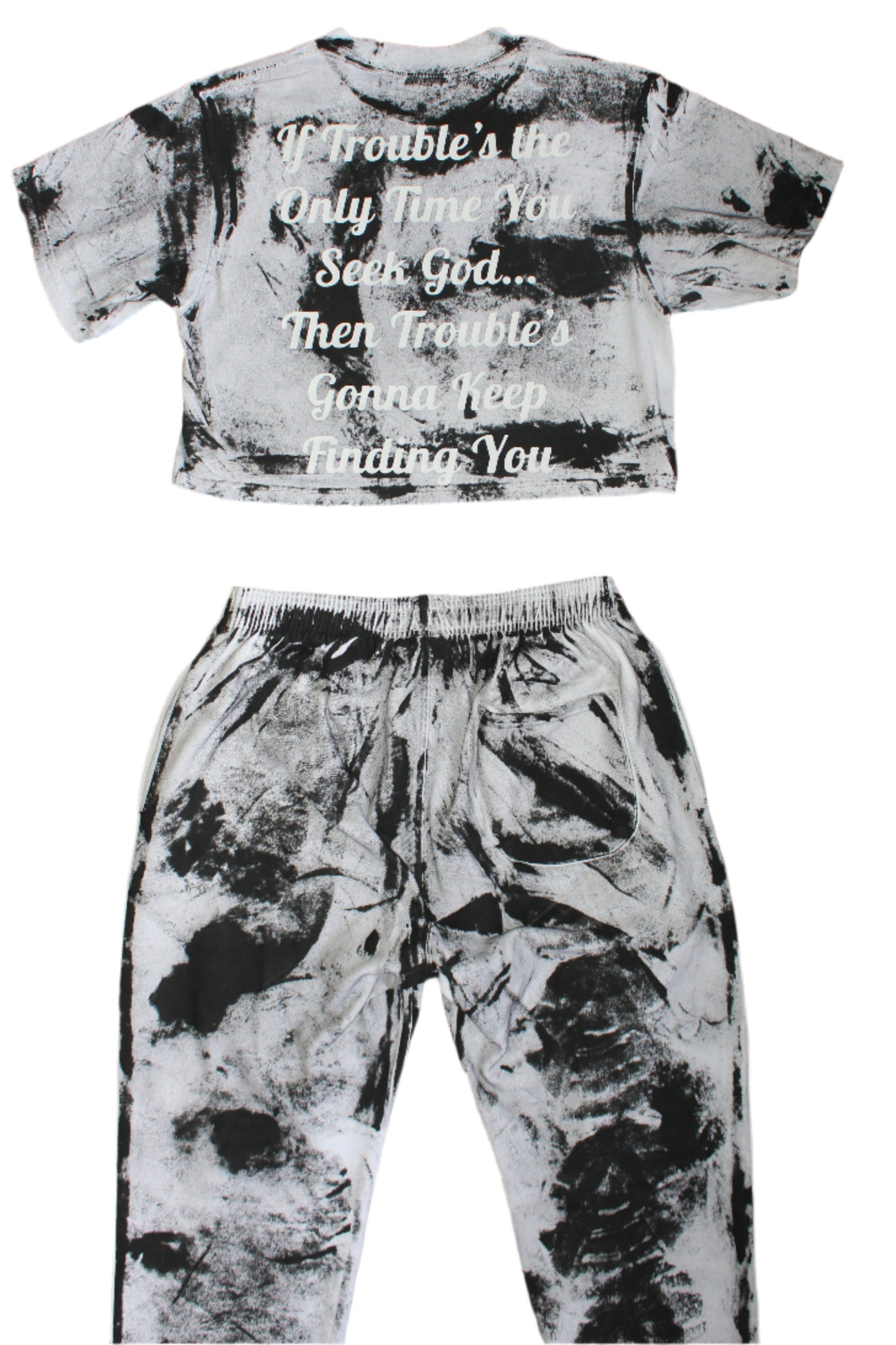 Tie-dye t-shirt and pants set with text on a tiled floor background