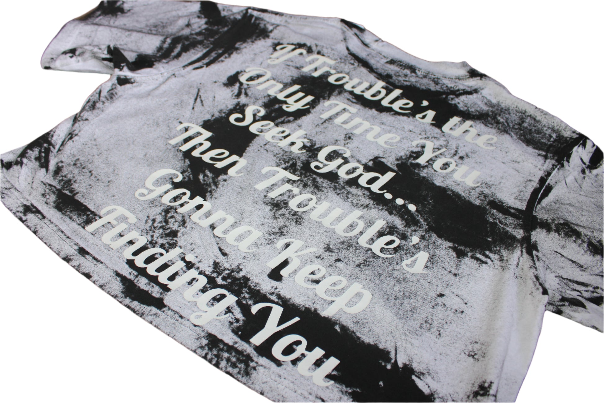 Textured fabric with printed text on a wooden surface